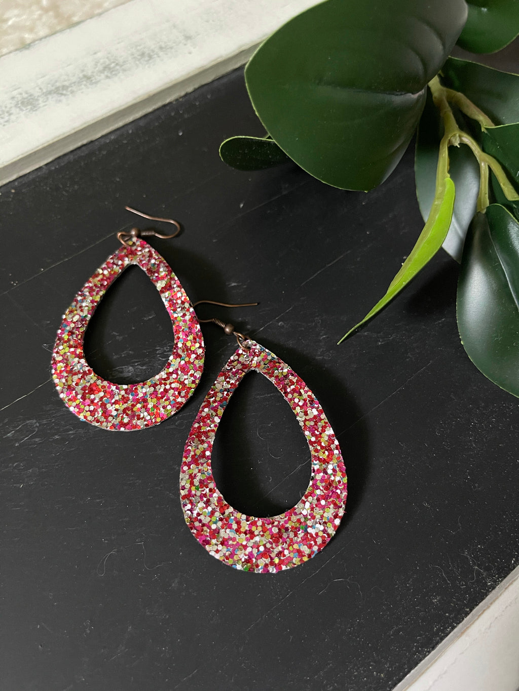 pink/ silver sparkle oval hoop earring